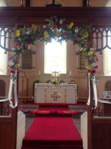 The screen decorated for a wedding